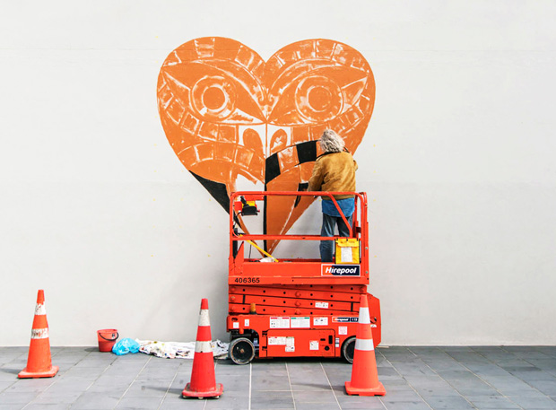 The heart of the city: artist Dick Frizzell at work on his Downtown Tiki.