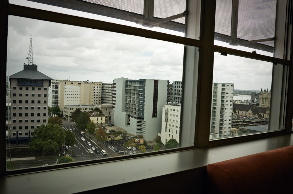 The councillors' lounge in Auckland's Civic Building looks out on the backs of apartment blocks, with the Central Police Station to the left.