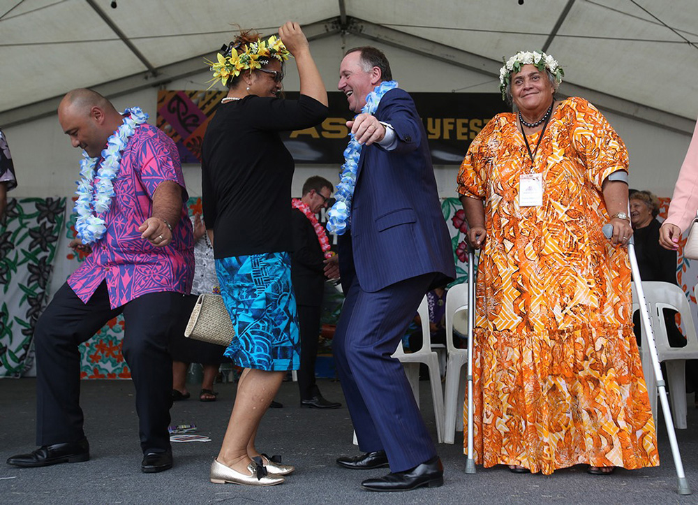 Prime Minister John Key gets in the spirit of Polyfest. Photo: Ben Campbell.