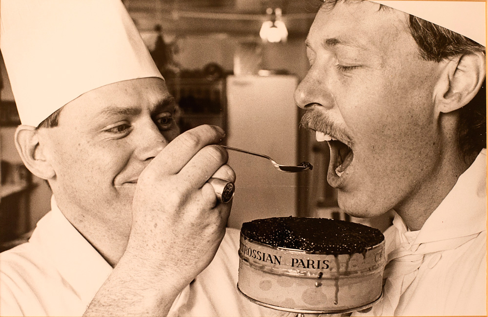 The heady days of Petit Lyon – Kent Baddeley feeds business partner Ian Garner from a $5000 tin of caviar. 