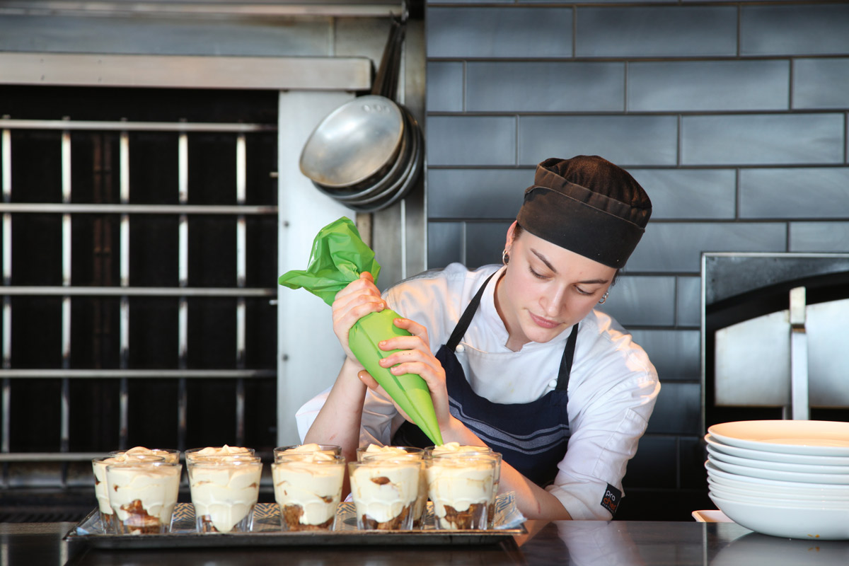 Pastry chef working at St Heliers Bay Cafe and Bistro, Auckland