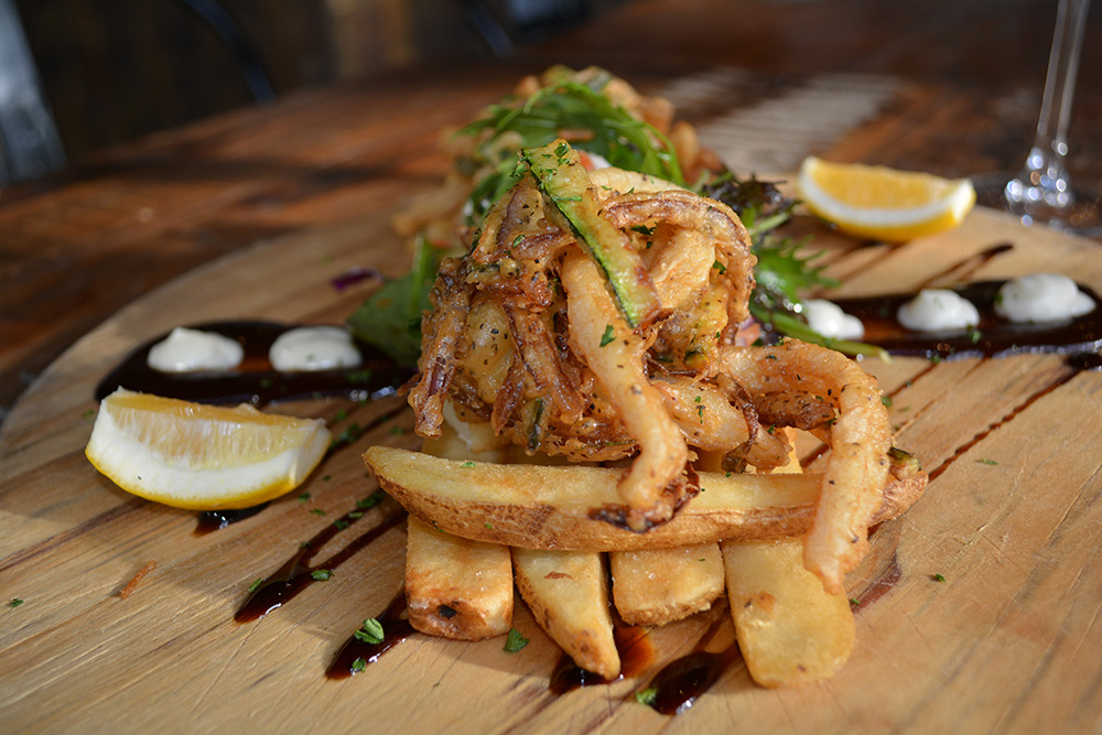 Calamari fritter at Seafood Central at the Auckland Fish Market. Photo: Delaney Mes for Metro. All rights reserved.