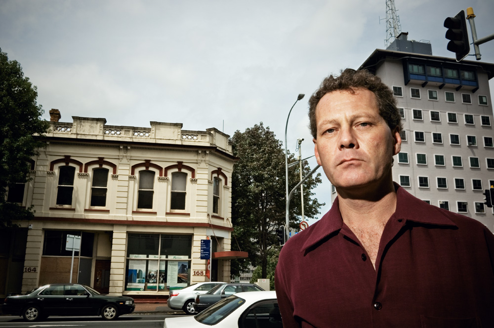 Heritage campaigner Allan Matson outside the 1885 Canvas City Building (left) on Hobson St, which the owner wants to demolish: "This was a lovely Edwardian and Victorian city in the 1970s. And how it's nearly all gone."