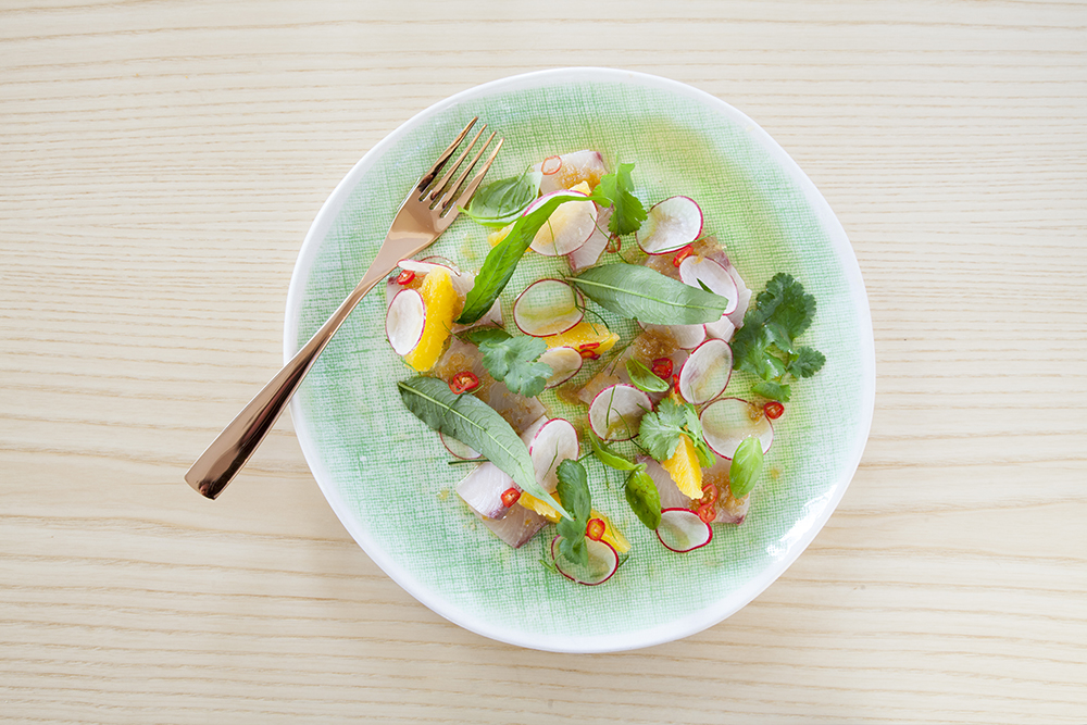 Tiradito salad with kingfish, apple, grapefruit, radish and chilli. 