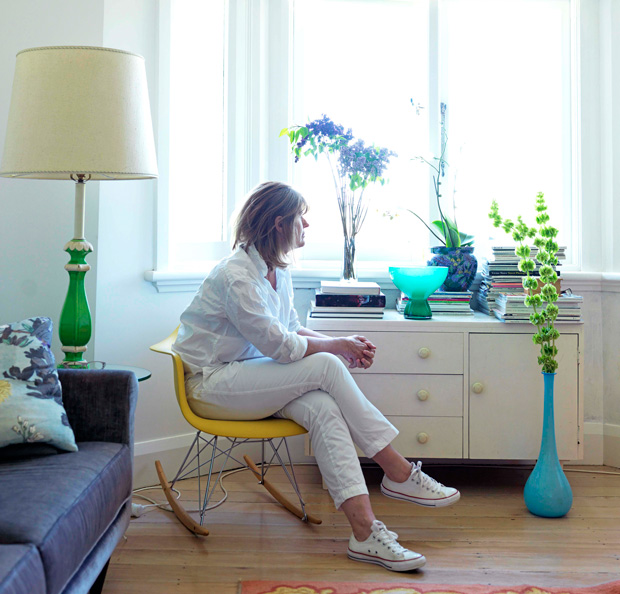 Carolyn Haslett in her corner courtville apartment.