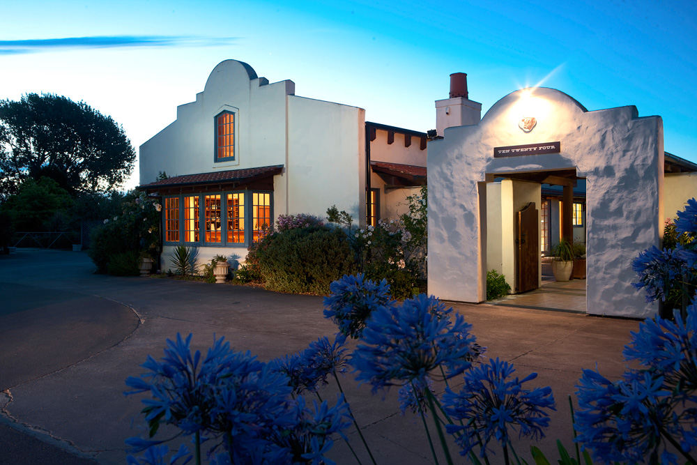 Kent Baddeley’s Ten Twenty Four restaurant is faux-Arizona: plastered walls, terracotta tiles, and big wooden beams holding everything up. 