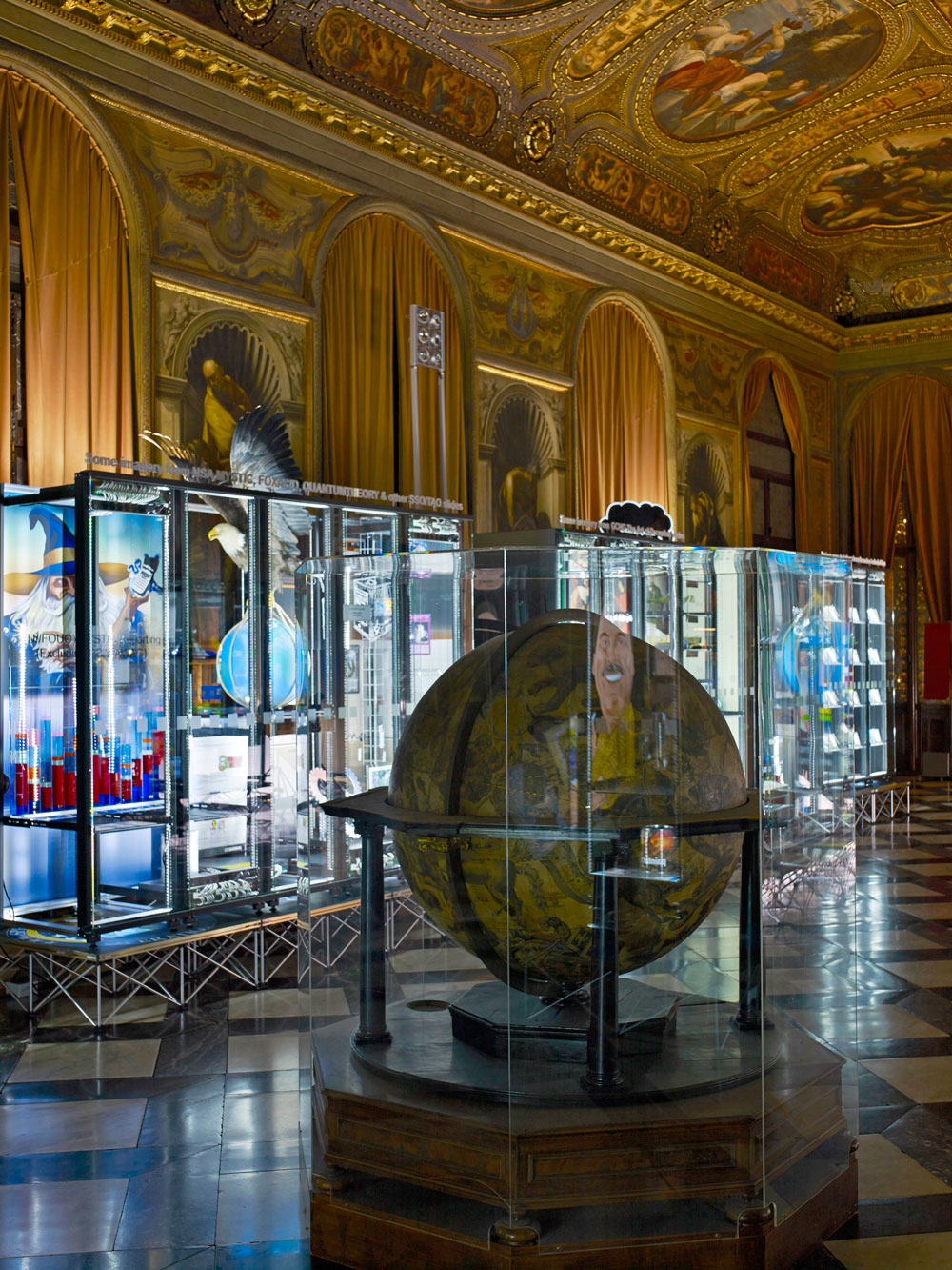 Vincenzo Coronelli globes and Simon Denny Secret Power server racks in the Marciana Library