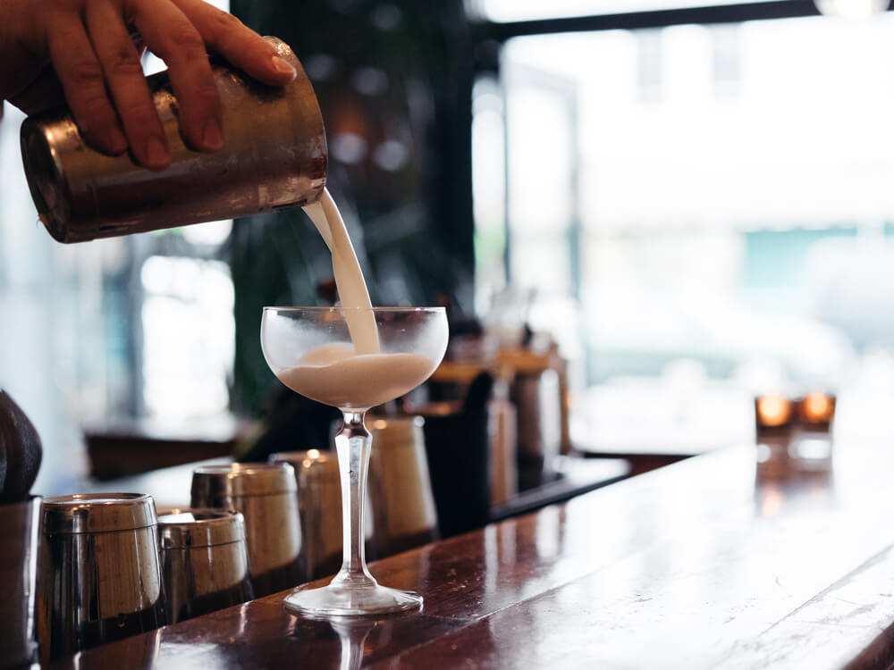 Madame George's signature pisco sour. Photo: Josh Griggs
