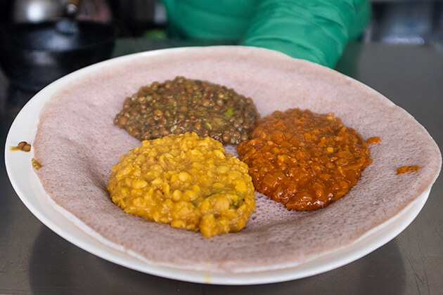 Stews on injera.