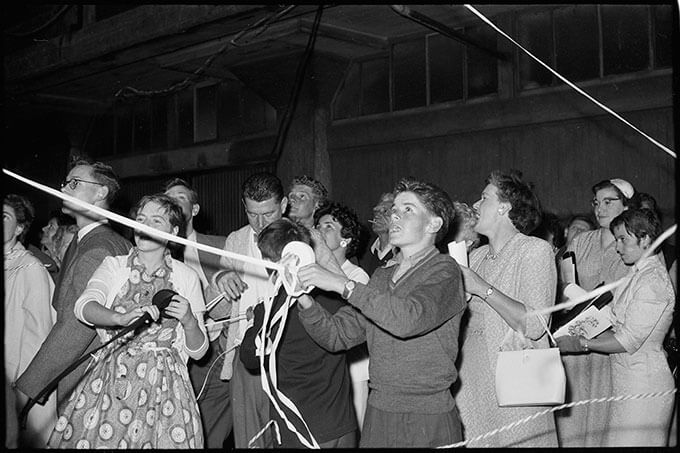 Farewells on the Auckland wharves, captured by photographer John Rykenberg