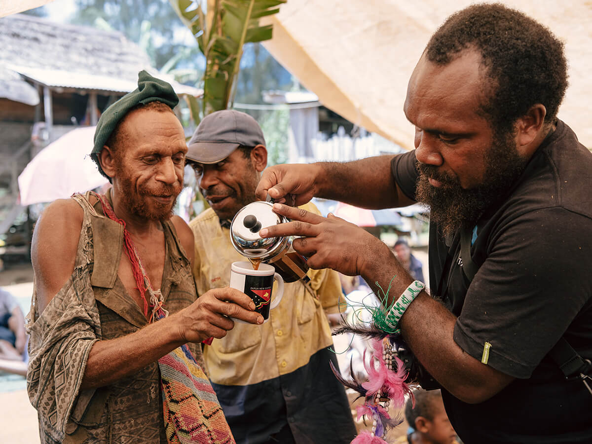 On their regular trips to visit coffee cooperatives in Papua New Guinea Kokako brew coffee with a plunger, often sharing coffee with farmers who have never even tasted the fruits of their labour. This is pictured on a 2018 trip, to the Unen Choit Coffee Cooperative in Papua New Guinea with Chairman Molock Terry. Photo: Josh Griggs