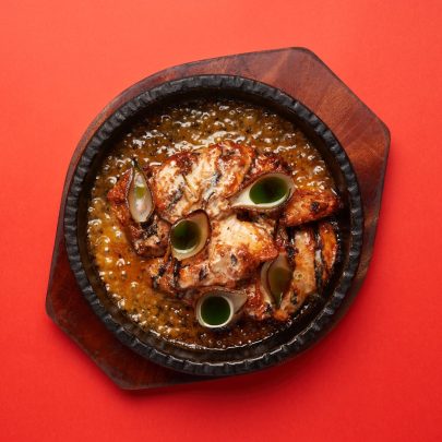 Charred chicken with comté and leek oil — Gochu